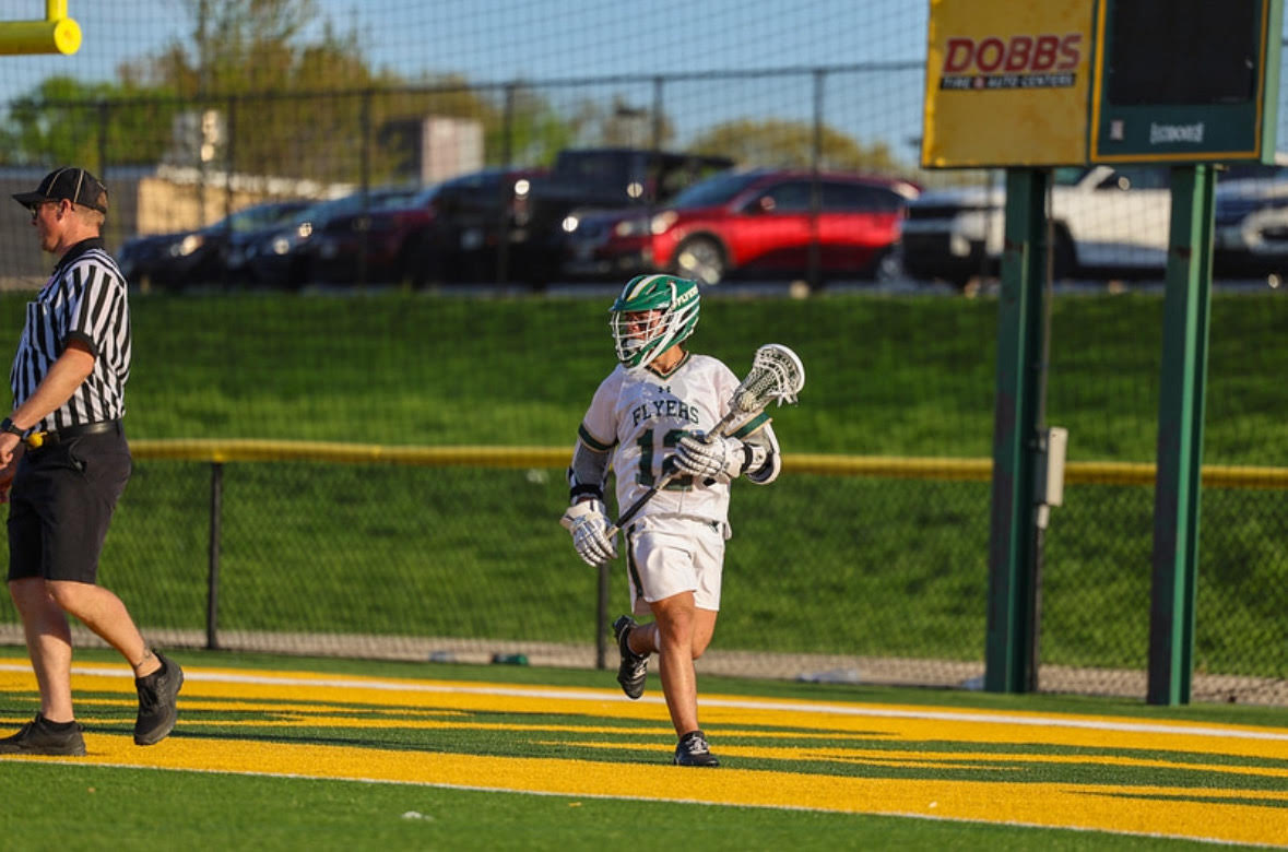 Senior Attacker Rome Crocker (#12) prepares for his senior lacrosse season, in the spring, by playing in a 7v7 lacrosse league for Lindbergh in the fall. “This really just helps sharpen my stick skills and get me ready as the season is very gruesome with a lot of challenges and hills to climb,” Crocker said. 